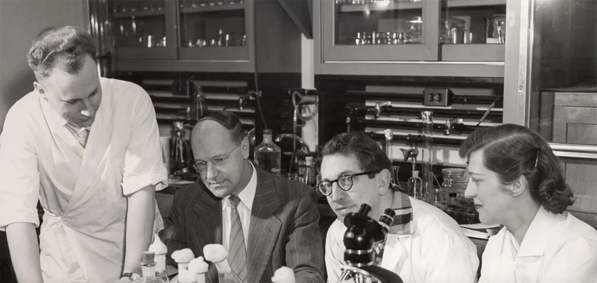 early cancer researchers at the University of Wisconsin pictured in a lab.